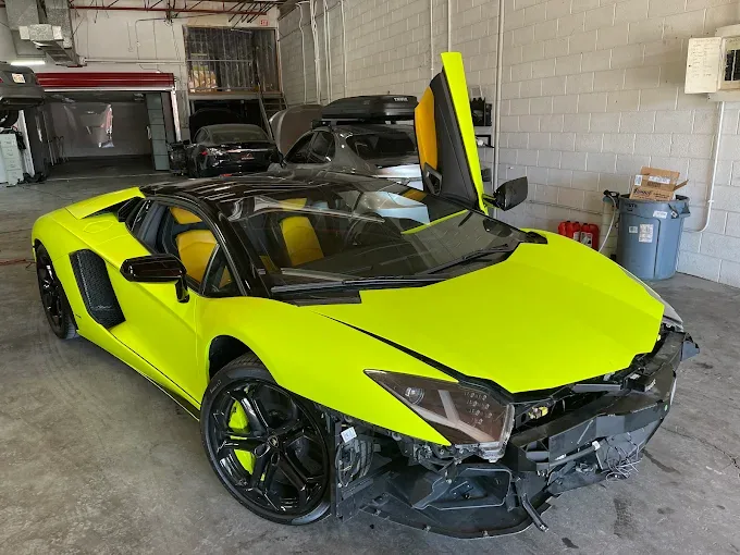 Lamborghini body panel dent repair at Westway Collision Center serving Carrollton, TX and DFW